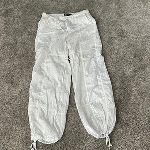 White parachute pants from Motel Rocks